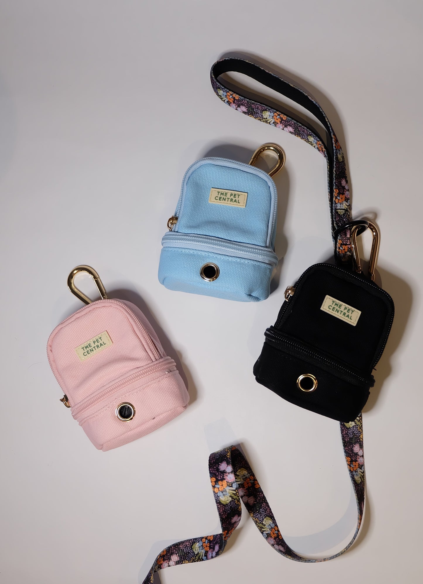 The Pet Central - The Paw Pack in Blue, Pink, and Black Attached to the Native Nighttime Lead