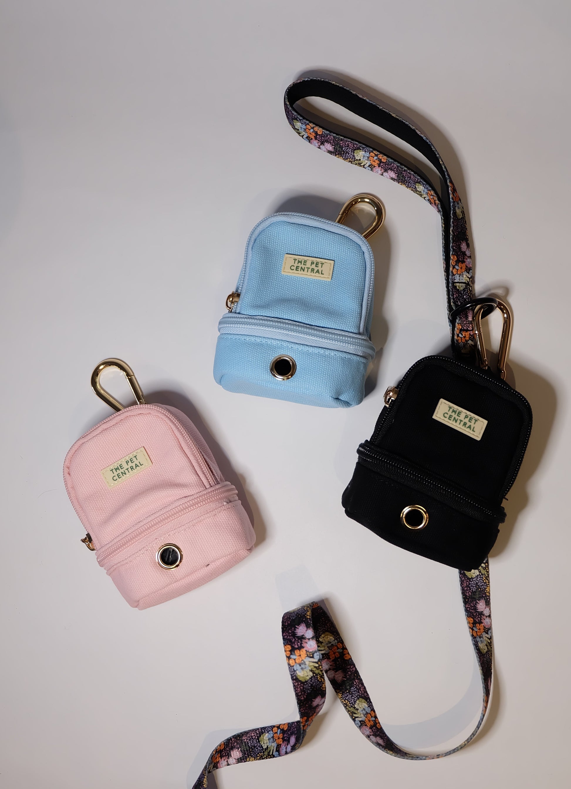 The Pet Central - The Paw Pack in Blue, Pink, and Black Attached to the Native Nighttime Lead