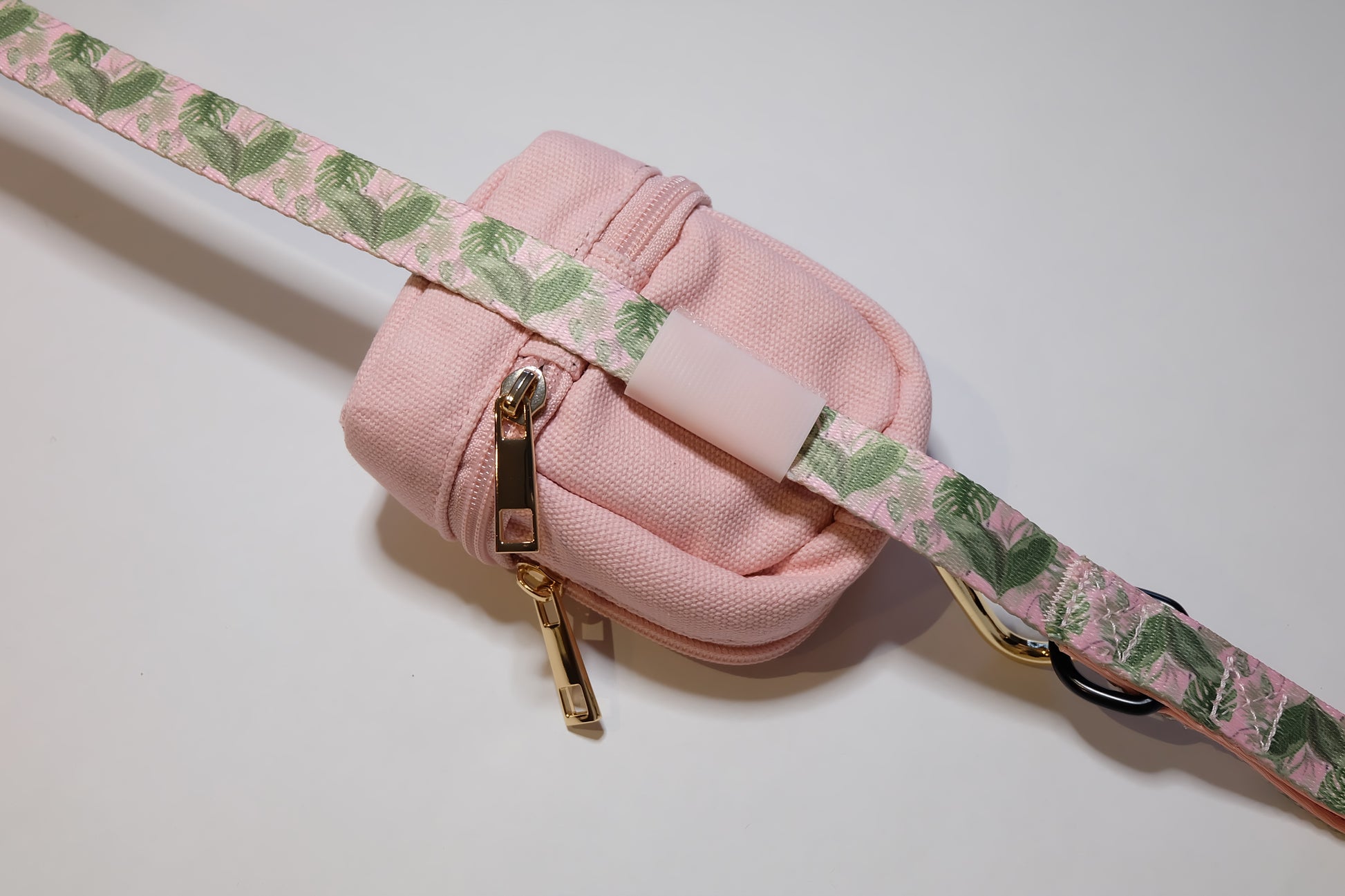 The Pet Central - The Paw Pack in Pink Attached to Tropical Bloom Lead (Back)