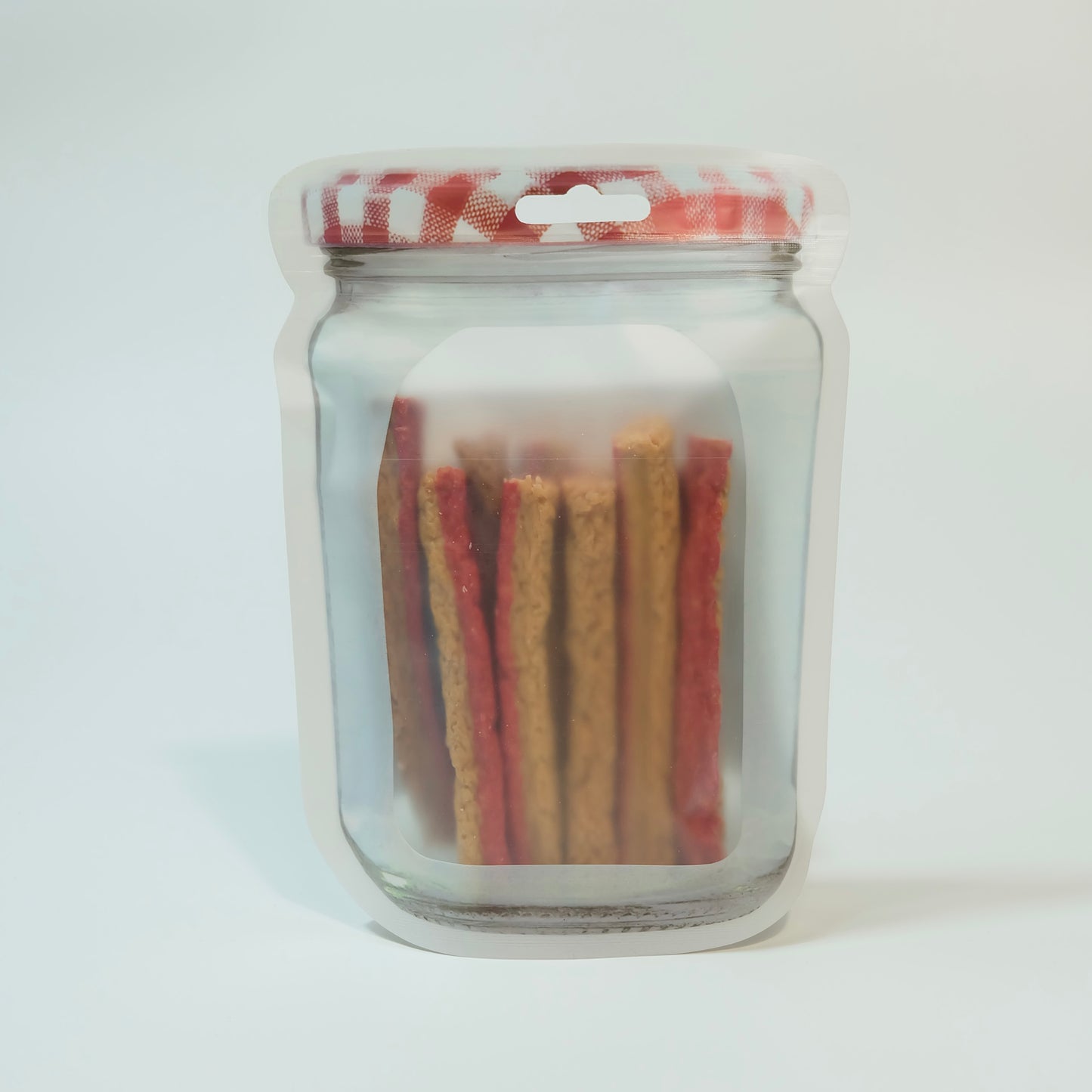 Dehydrated fish and prawn sticks laid out – high-protein, single-ingredient pet treats for dogs and cats