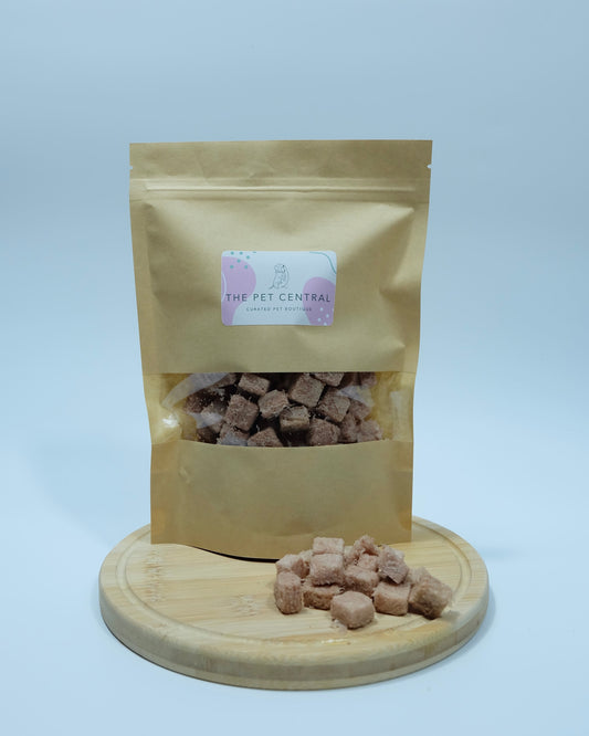 The Pet Central Freeze Dried Duck Packet with Meat in front