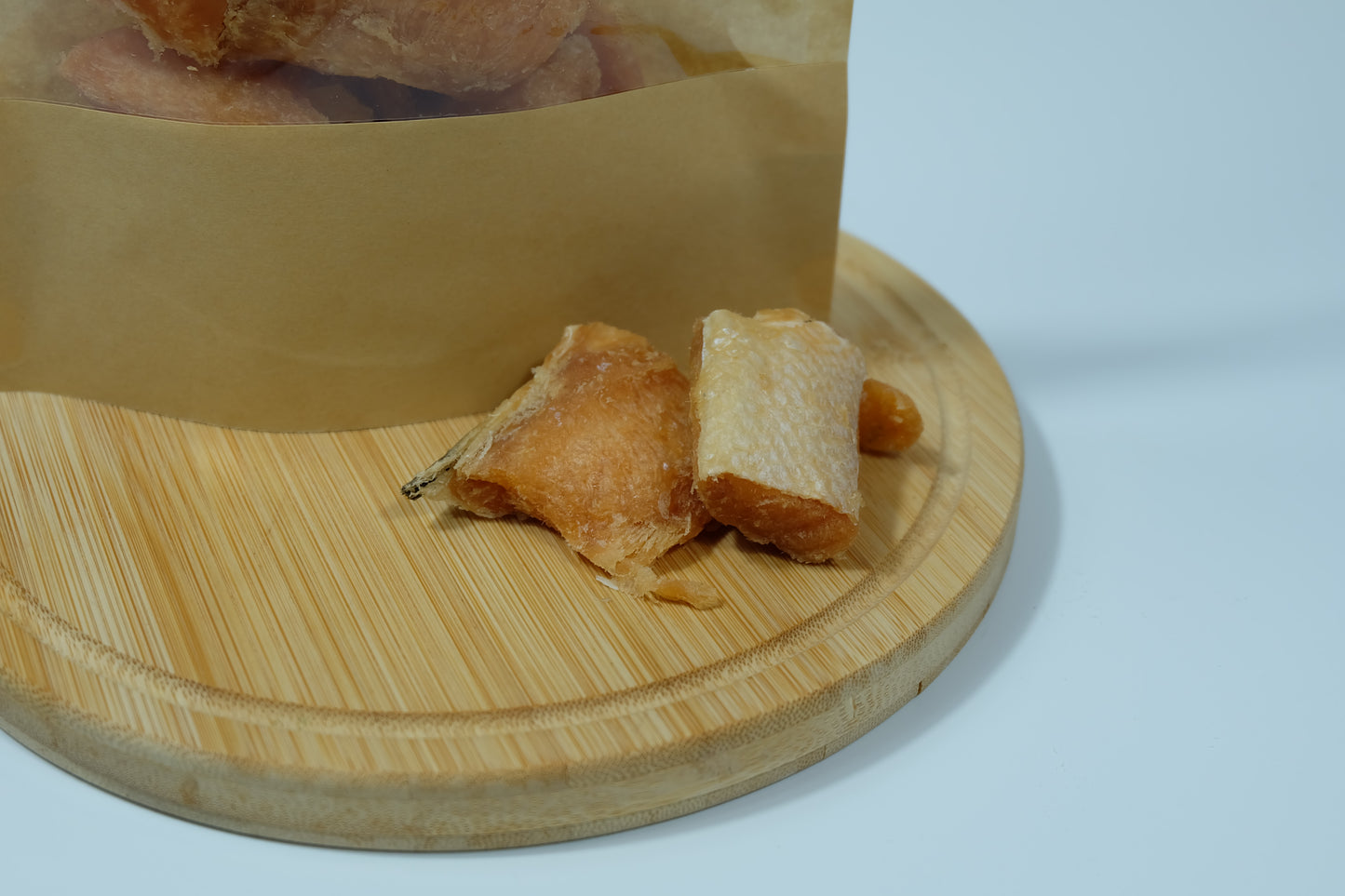 Close-up of freeze-dried salmon belly pieces – crunchy, nutritious pet treats with healthy fats