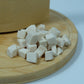 Close-up of freeze-dried chicken breast pieces – natural lean protein treat for dogs and cats