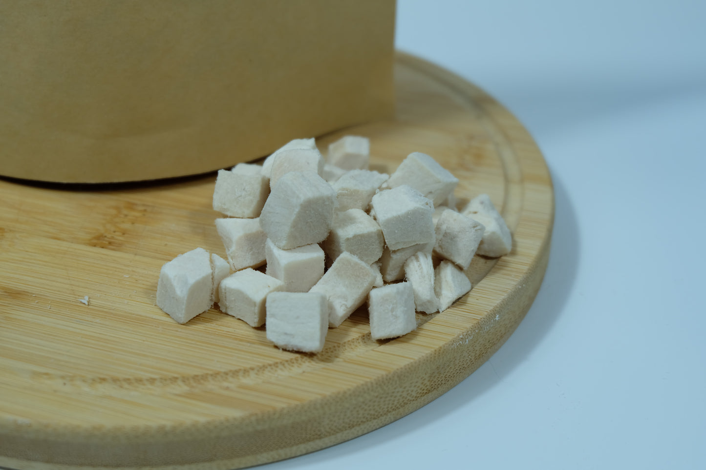 Close-up of freeze-dried chicken breast pieces – natural lean protein treat for dogs and cats