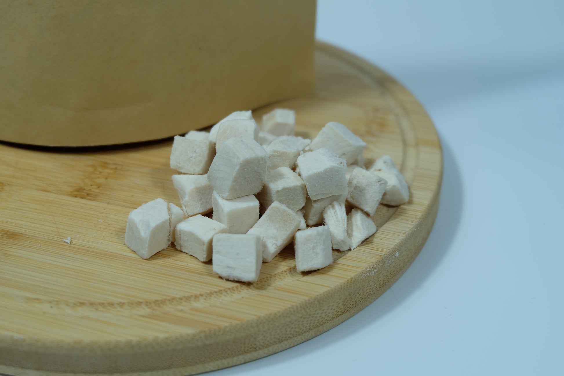 Close-up of freeze-dried chicken breast pieces – natural lean protein treat for dogs and cats