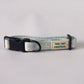 The Pet Central Blue Cheetah dog collar with black plastic clip and black metal D ring for connection to matching dog lead.