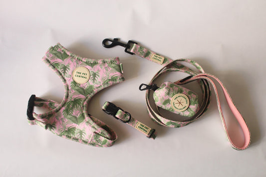 The Pet Central Tropical Bloom Dog Harness Set including adjustable dog harness, dog collar, dog lead, and poop bag holder