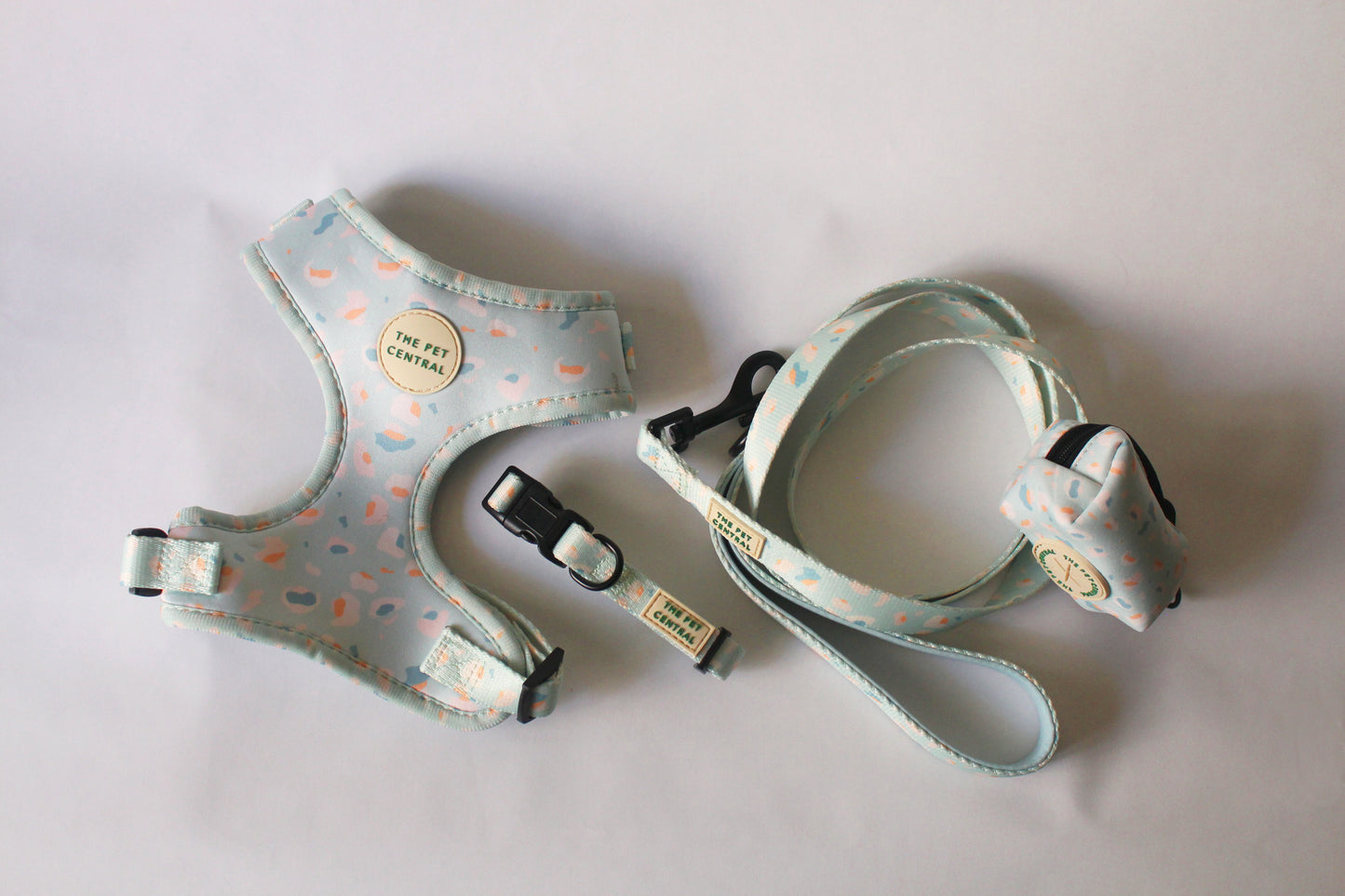 The Pet Central Blue Cheetah Dog Harness Set including Dog Collar, Dog Harness, Lead, and Poop Bag Holder (Front)