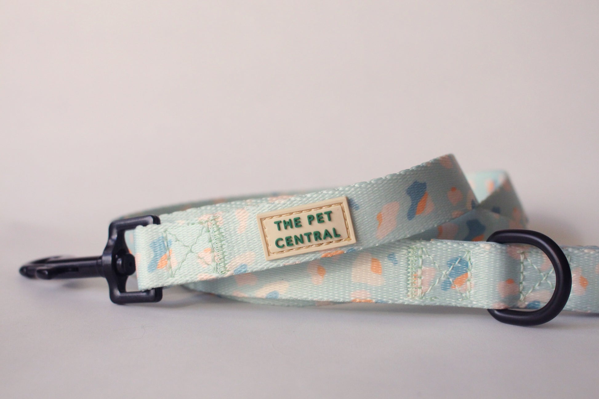 The Pet Central Blue Cheetah dog lead logo and black hardware.